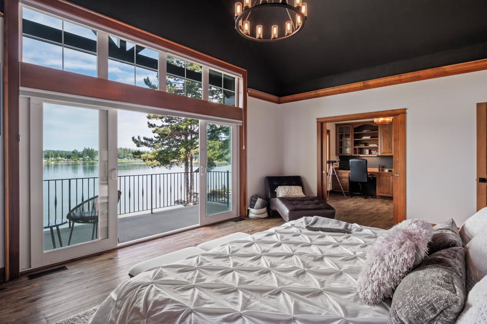 Master Suite with en-suite bathroom, balcony with views, and adjacent office.