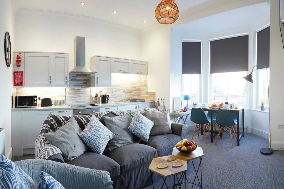 Living Room area accessible to the Kitchen and dining area, sea views!