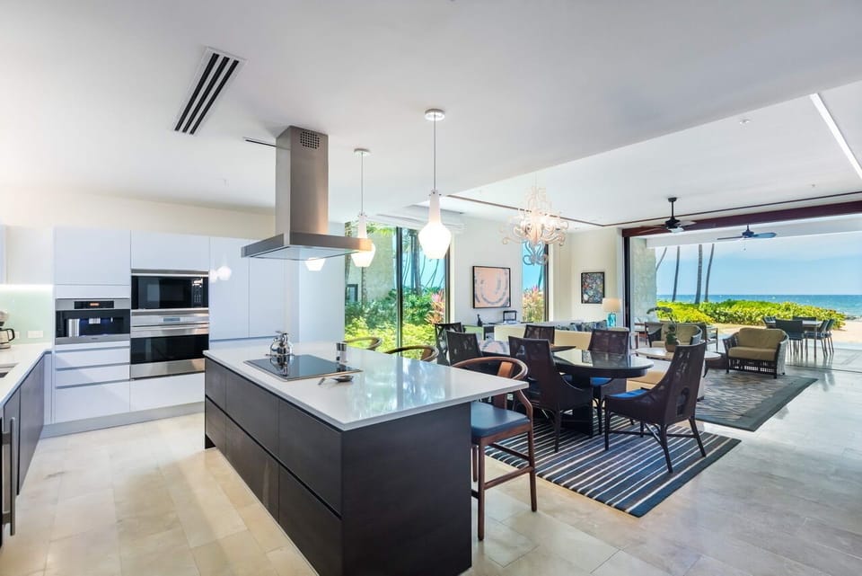 Open plan design for kitchen and living room, with sweeping ocean views