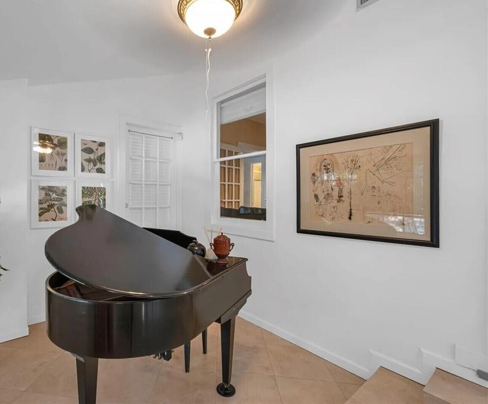 Front room with piano. 