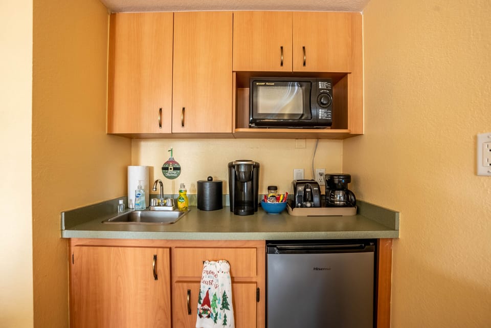 Kitchenette including, mini-fridge, microwave, toaster, coffee, & more!