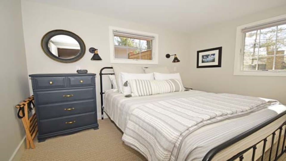 Relax in Queen Bedroom 2 with the same sumptuous bedding as Bedroom 1
