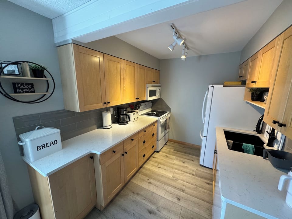 Galley kitchen with quartz countertop