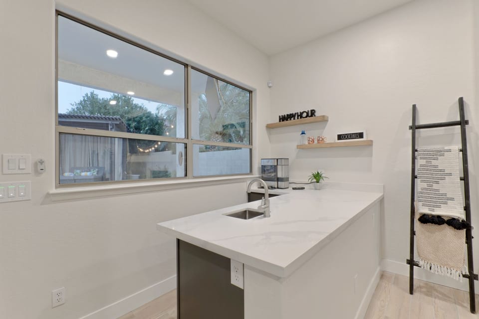 Bar area with nugget ice maker and wine cooler