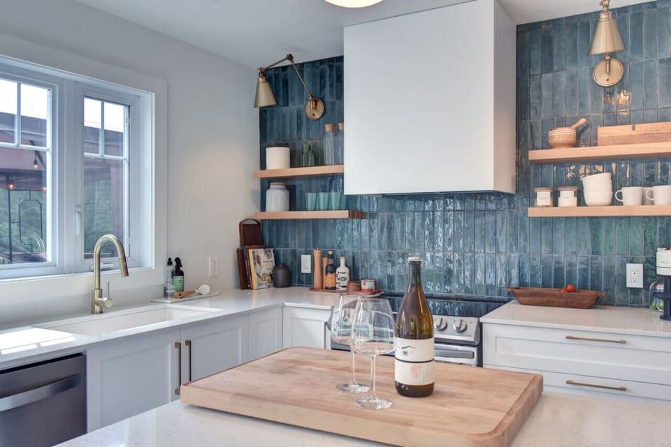 Bright and clean white kitchen with spacious countertops—perfect for cooking and meal prep.