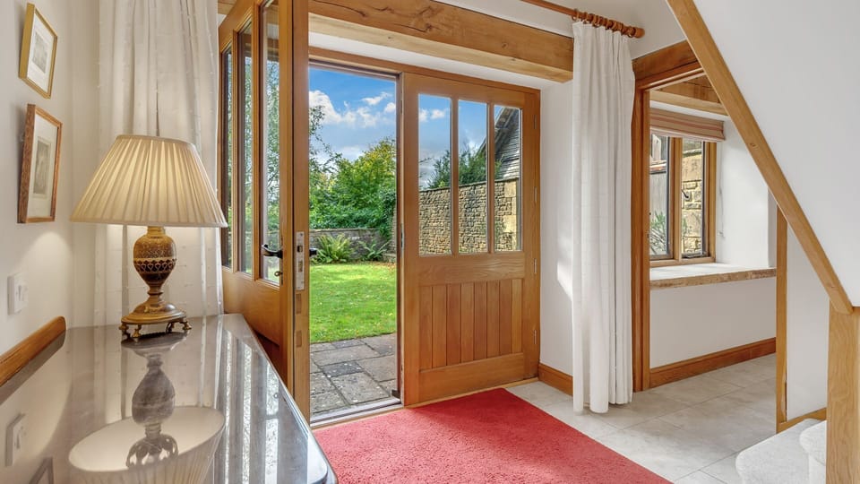 The main hallway opens out to your private garden.