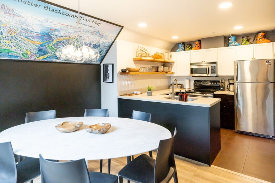 Bright and modern kitchen with a spacious dining area — ideal for cooking, dining, and creating memories with loved ones.