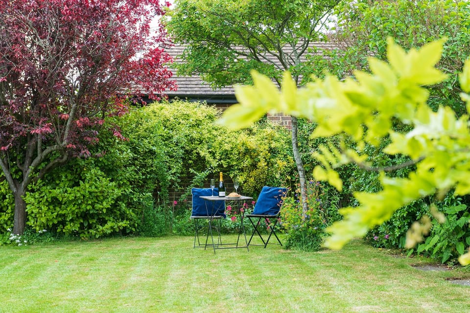 With its south facing aspect, the mature landscaped garden provides all day sun late into the evening. The mature trees, hedging and planting ensures privacy during your stay and the Weber BBQ