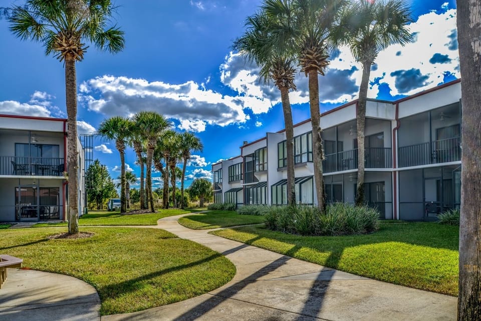 Stroll shaded paths between villas and breathe in the sunshine.