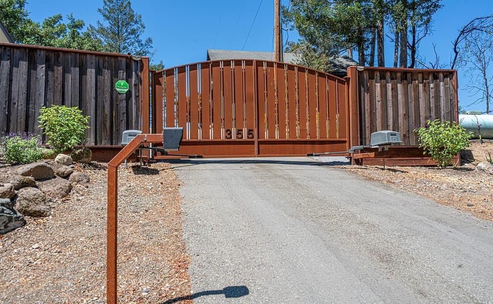 Main gate entrance to house. 