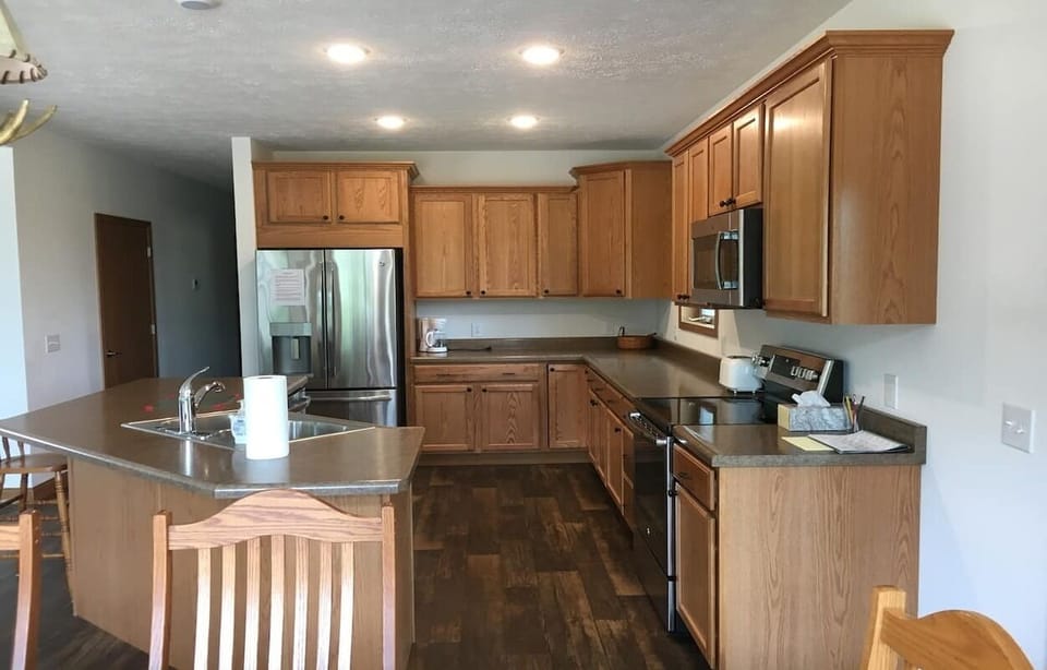 Fully stocked kitchen with all the modern appliances.