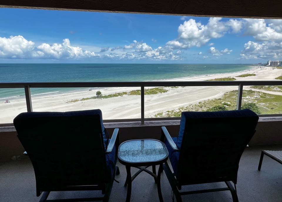 We saved you a seat with the best view in the house- enjoy night - We saved you a seat with the best view in the house- enjoy nightly sunsets and beachfront views 24/7 while you're here!