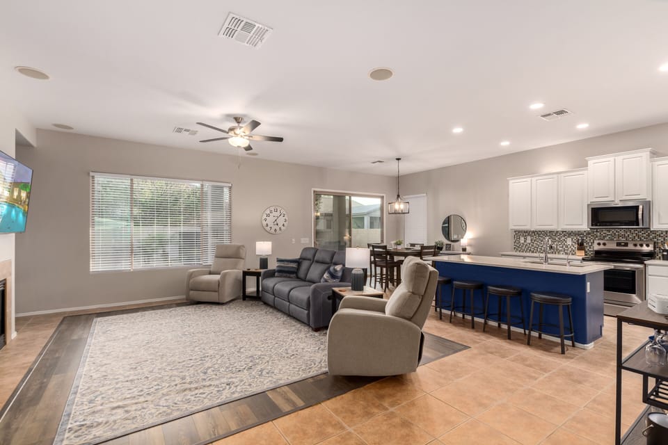 Relax and kick back in the great room, complete with a 65" TV.
