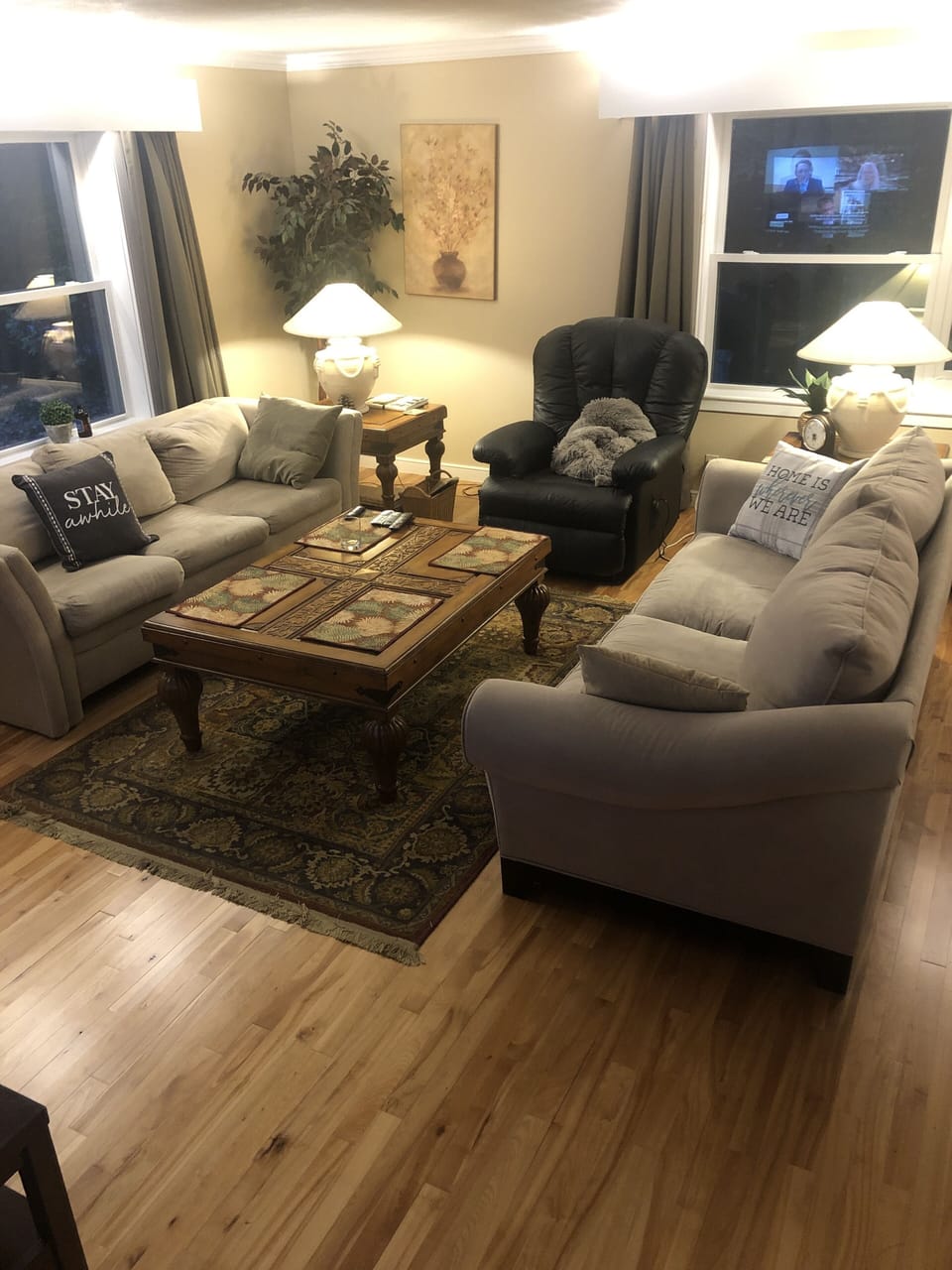 Spacious living/game room includes two couches, one folds out into a double bed.