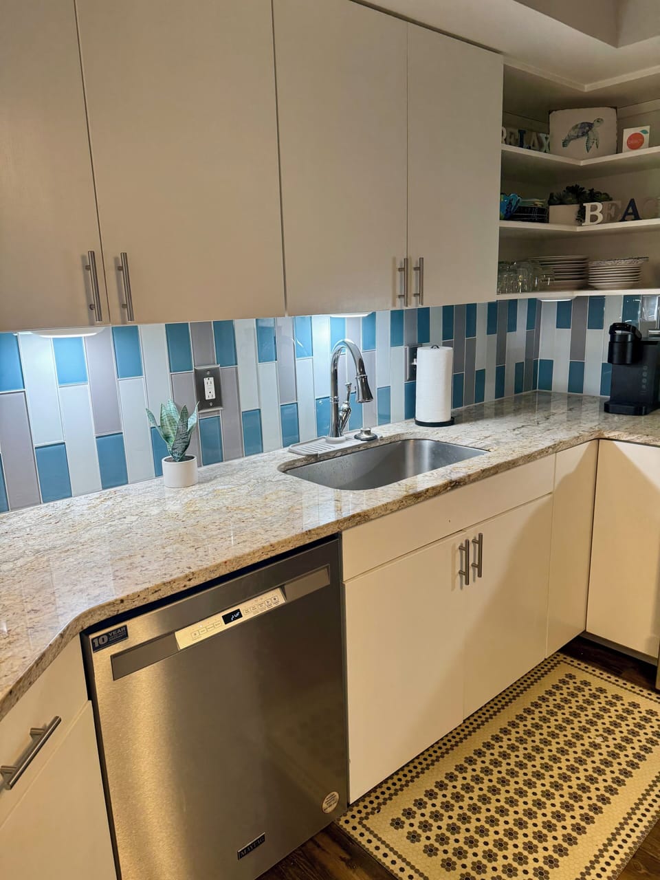 New, modern backsplash in kitchen.