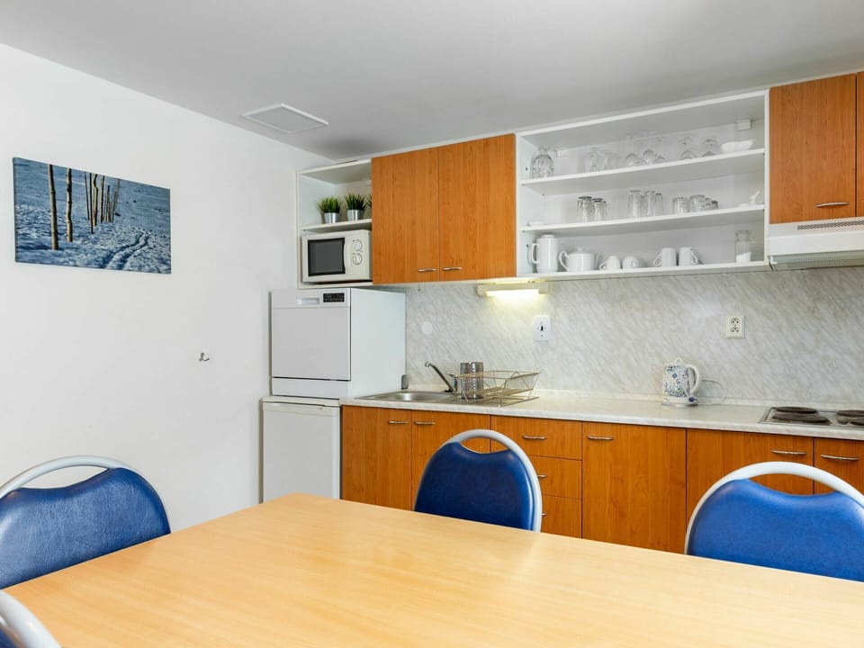 Cabinetry, Furniture, Property, Countertop, Table, Kitchen Sink, Wood, Tap, Building, Sink