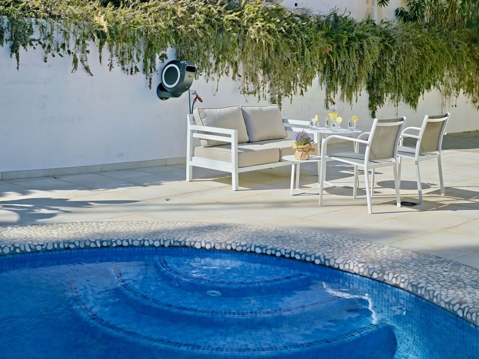 Water, Plant, Azure, Blue, Swimming Pool, Outdoor Furniture, Body Of Water, Shade, Chair, Leisure