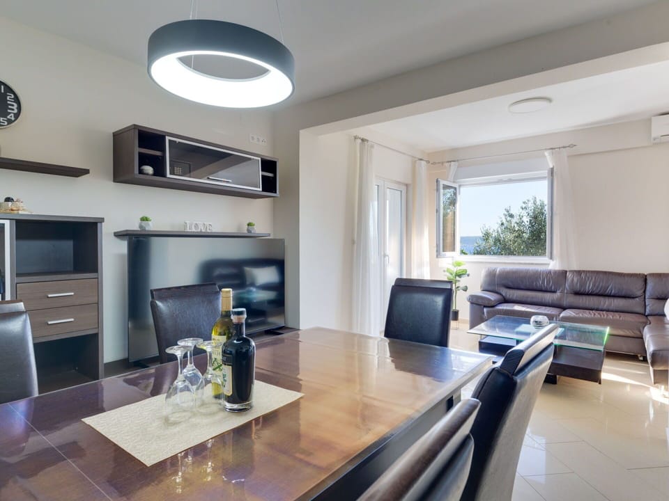 Property, Furniture, Cabinetry, Table, Interior Design, Lighting, Building, Countertop, Window, Plant