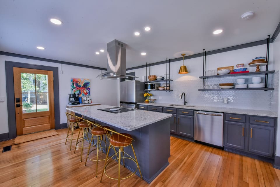 Kitchen - This gorgeous kitchen is equipped with everything you and your party will need to make the perfect meal or tailgate snacks.