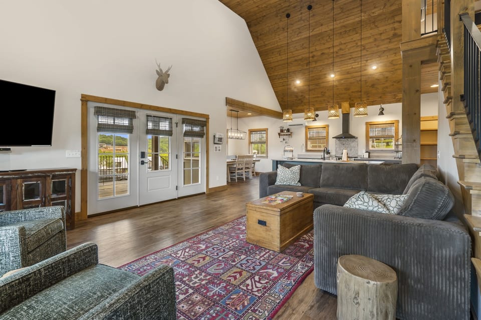 Living room area with smart tvs