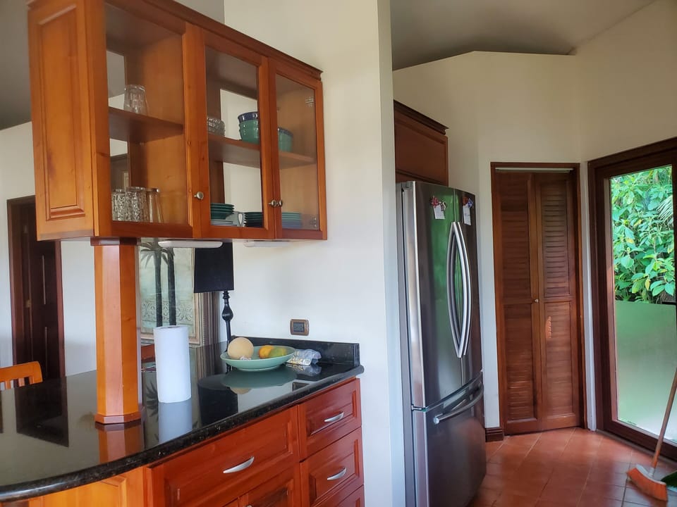 Kitchen island and large fridge