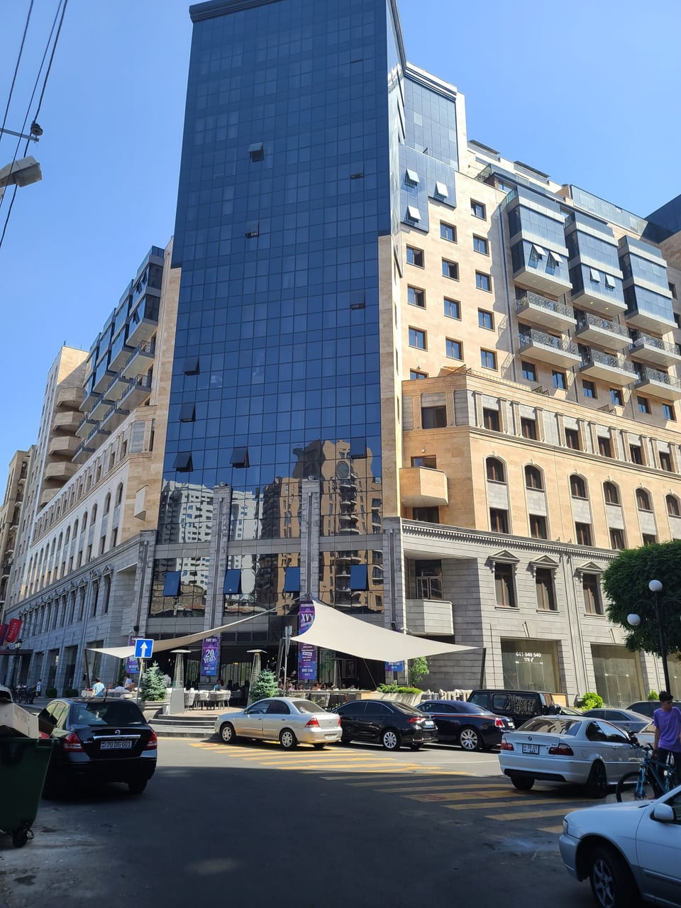 units are on the 11th floor centrally located in the blue glass window area .