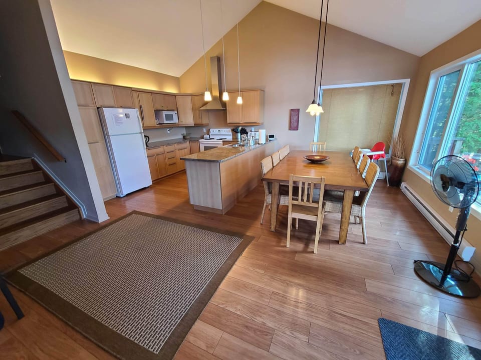Open concept dining and kitchen area.