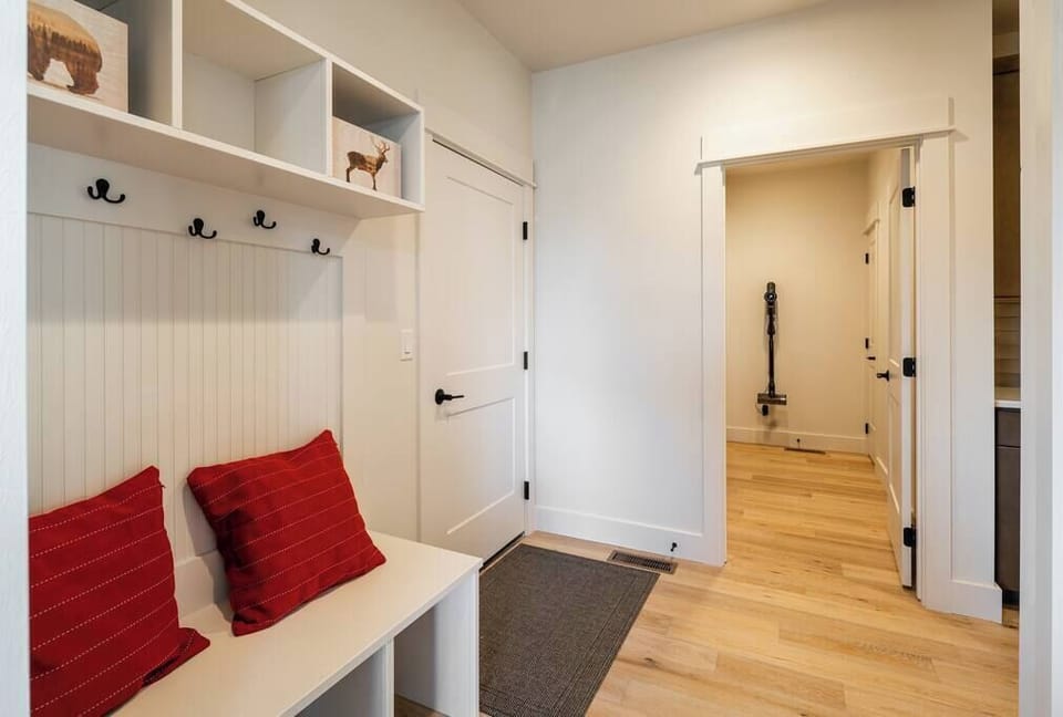 Mud room, access to garage, laundry room.