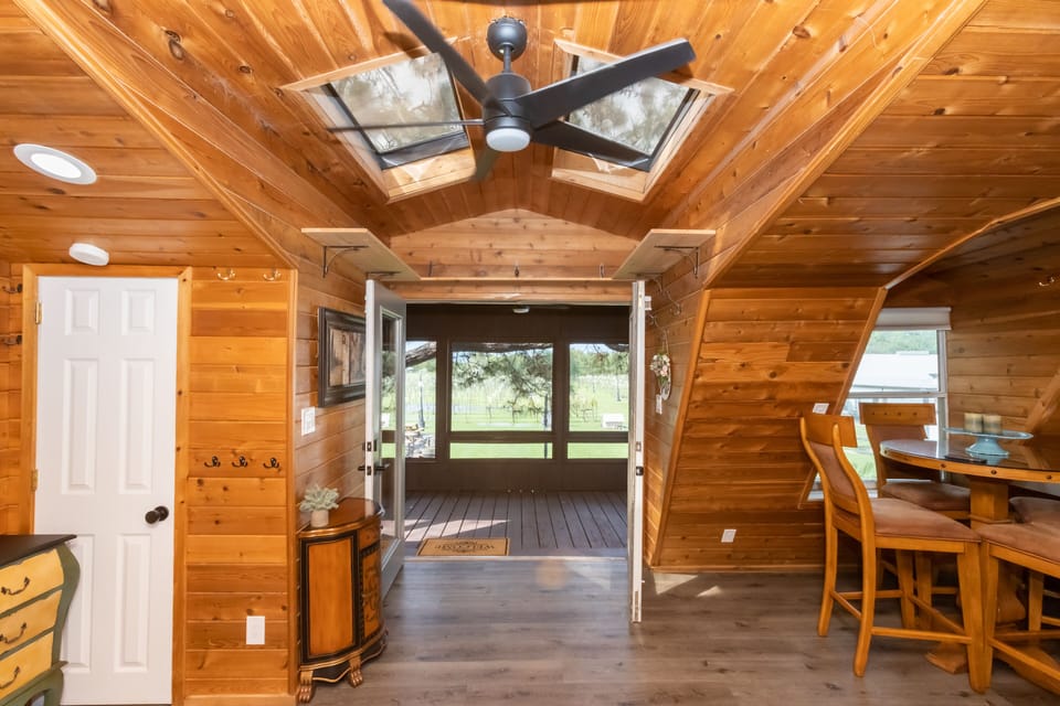 Indoor/outdoor during beautiful weather with the screened-in porch