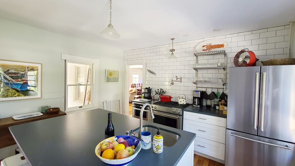 Well equipped kitchen with stainless appliances