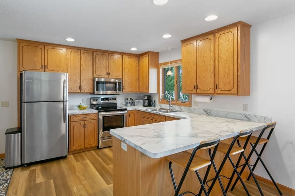 Updated kitchen with new appliances and counter tops.