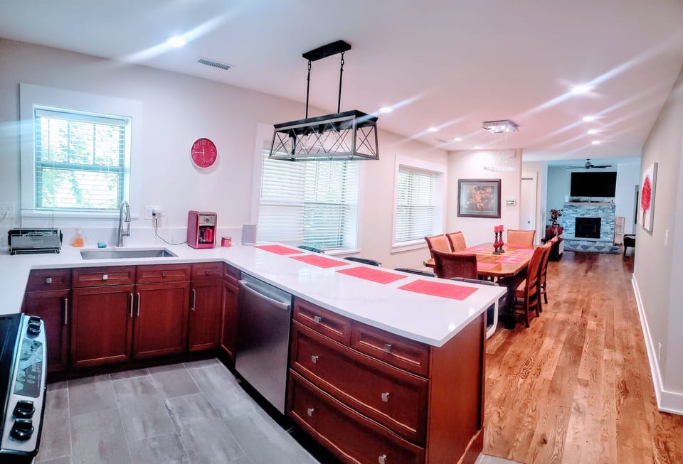 Open Concept Kitchen, Bar area and formal dining, all together can sit 10