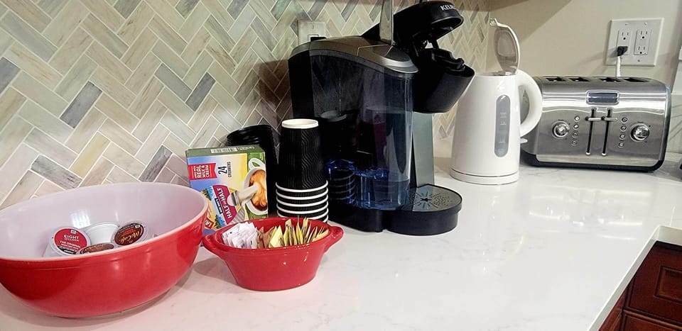Coffee/ Tea station, Keurig Coffee Machine with K-cups included and to go cups