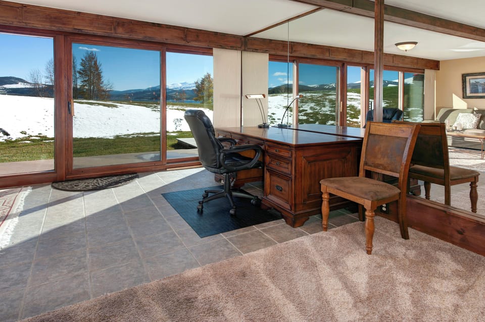 Office space with desk and work area.