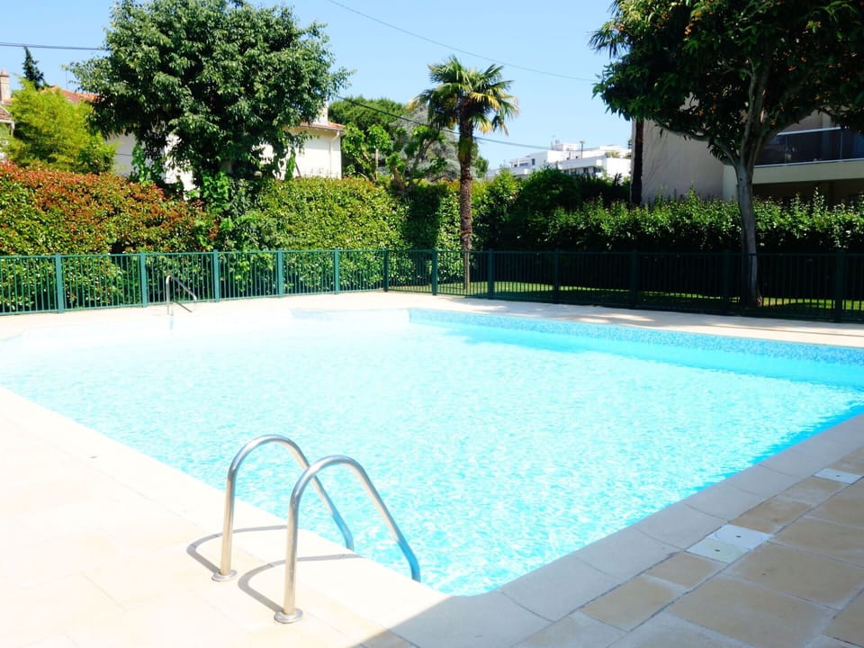 Water, Plant, Swimming Pool, Azure, Tree, Sky, Shade, Rectangle, Building, Composite Material