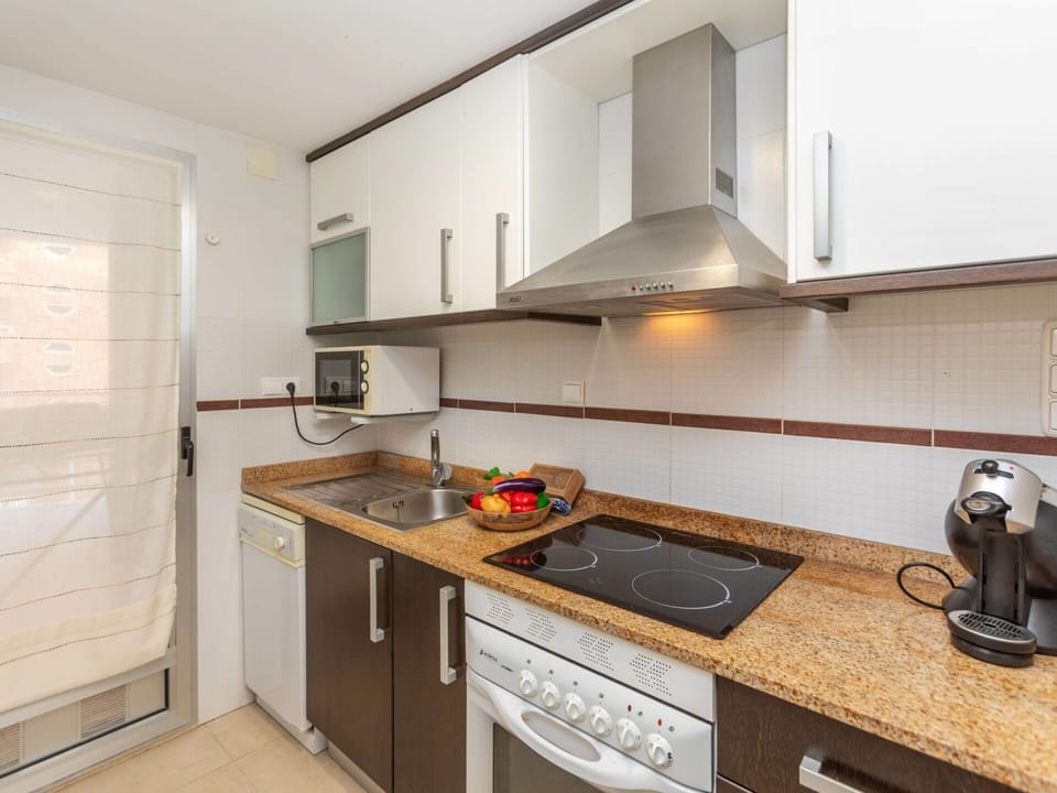 Kitchen, Countertop, Major Appliance, Kitchen Appliance, Interior Design, Cabinetry, Flooring, Wood, Sink, Furniture