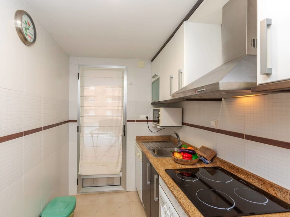 Countertop, Flooring, Kitchen, Interior Design, Wood, Major Appliance, Floor, Plumbing Fixture, Sink, Cabinetry