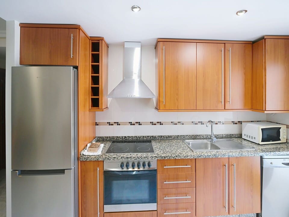Kitchen, Kitchen Appliance, Countertop, Major Appliance, Cabinetry, Furniture, Wood, Flooring, Interior Design, Home Appliance