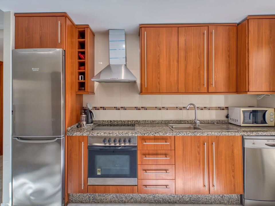 Cabinetry, Property, Countertop, Building, Kitchen Appliance, Kitchen Stove, Kitchen, Home Appliance, Interior Design, Wood