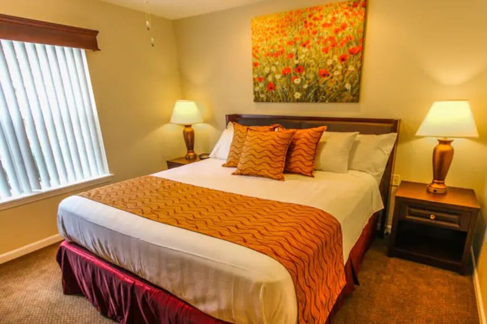 The queen sized guest bedding is comfy and inviting.