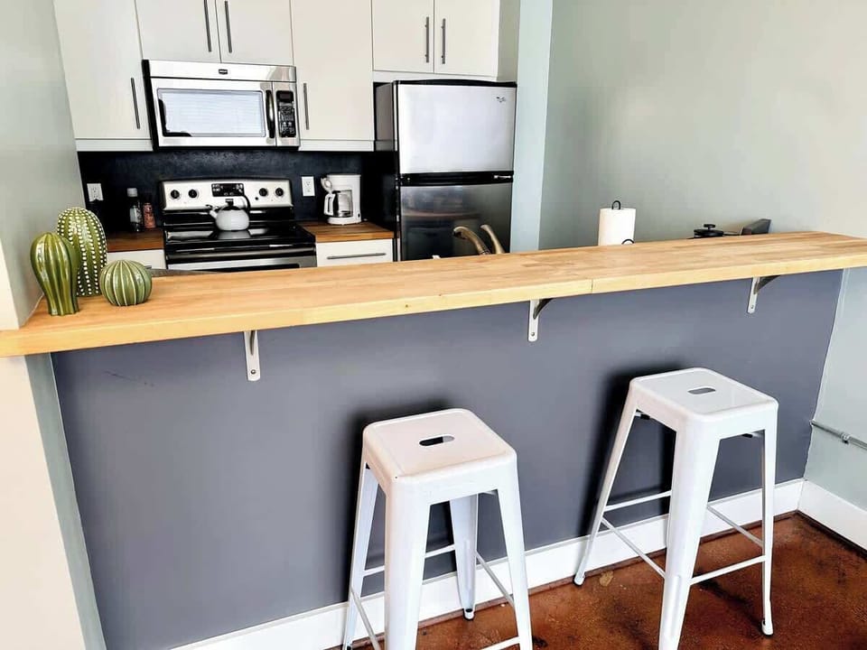 Kitchen with breakfast bar and updated appliances