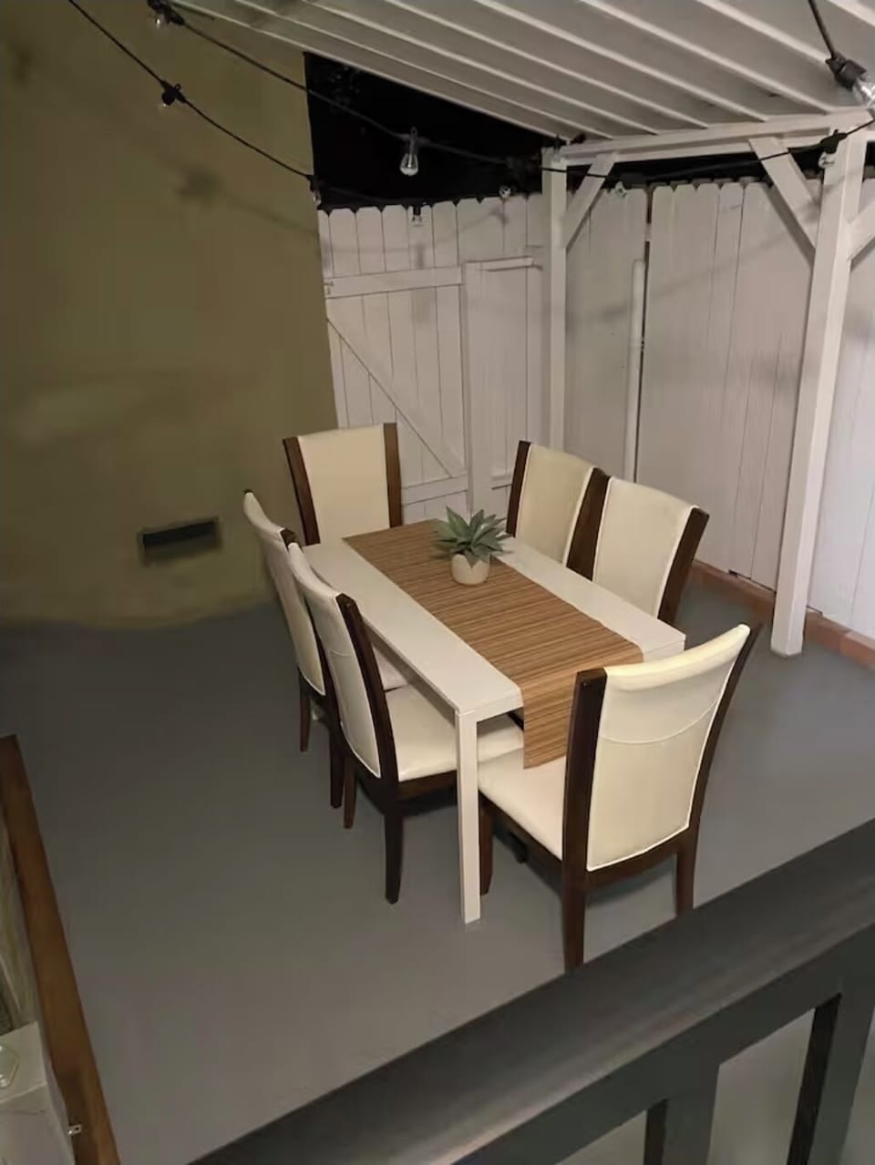 Private gated fenced back patio. With mood lights, table and 6 chairs