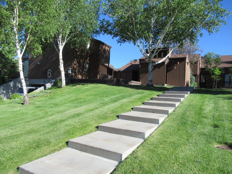 Condo Street entrance with city bus pick up every 15 minutes at base of steps