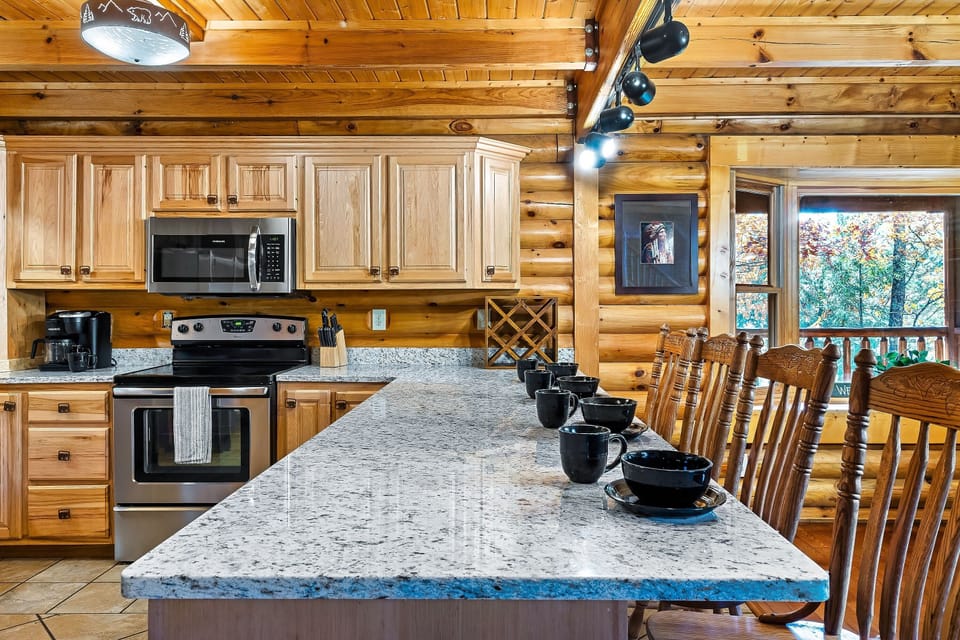 The newly refurnished kitchen counter top is a great spot for coffee or wine. 