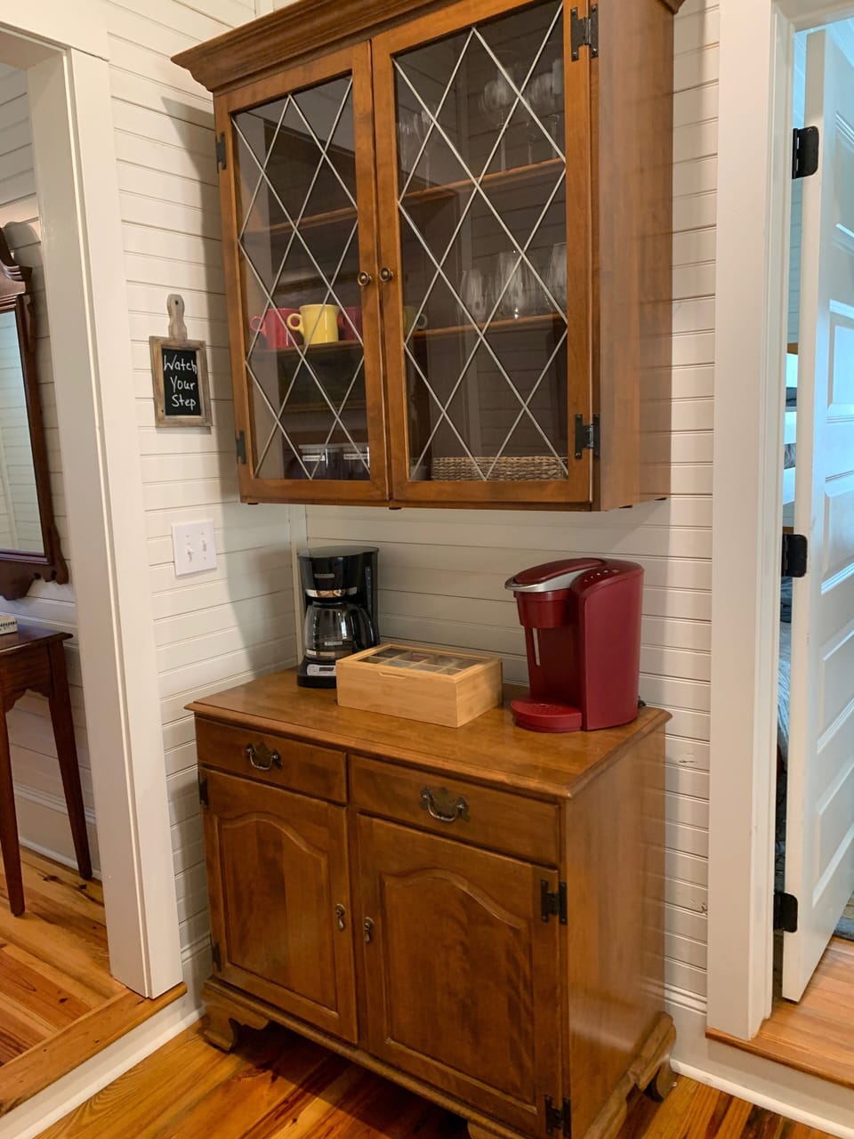 New drink bar with coffee, tea, wine glasses, mugs and sweeteners too.