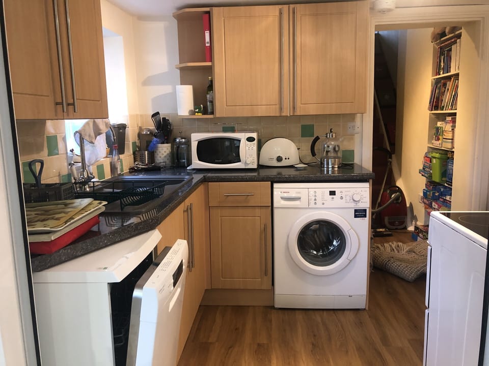 Fully equipped kitchen with adjoining games room.