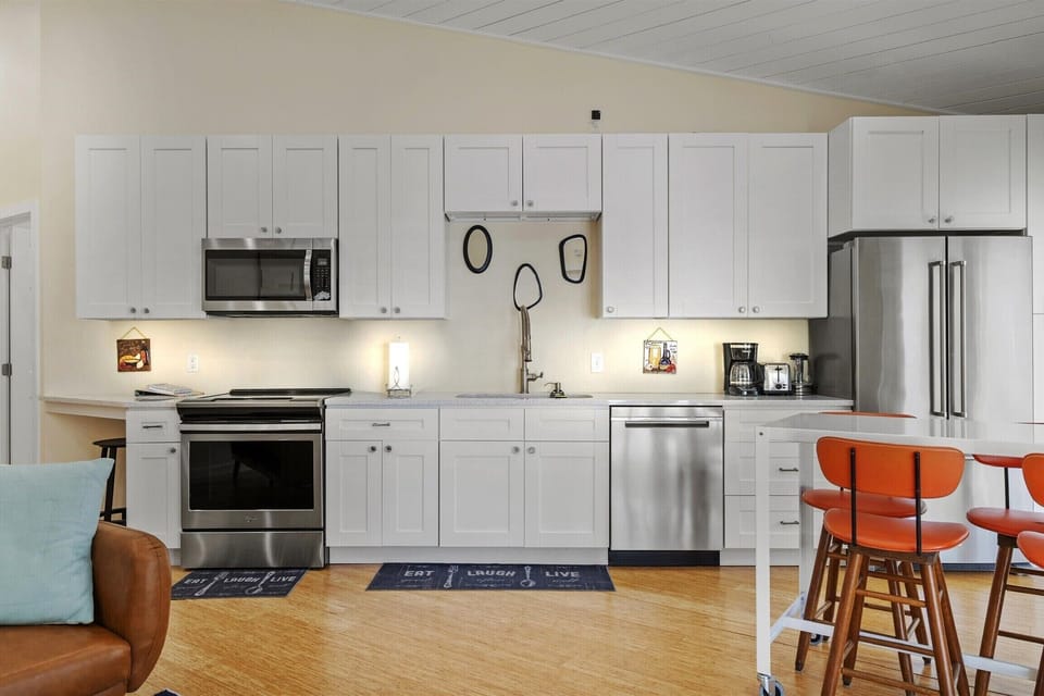 Fully equipped kitchen includes pots & pans, bakeware, dishes & basic supplies