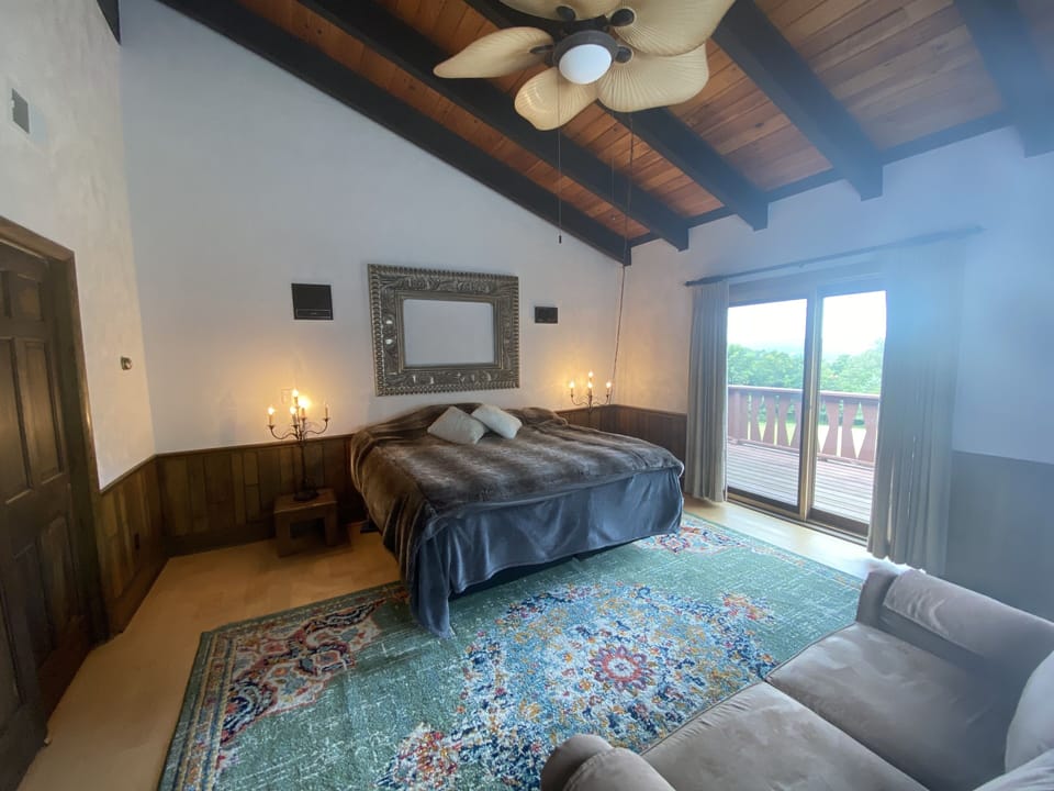 Bedroom #1 offers a king bed with cozy RH bedding and beautiful views. 