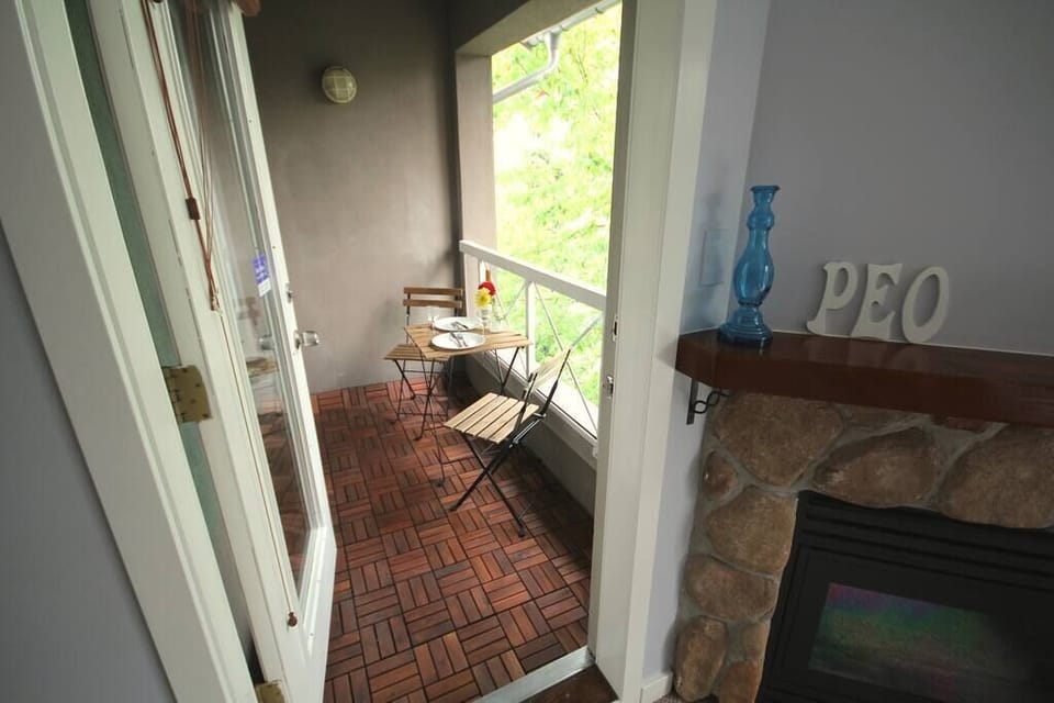 Step out to the balcony overlooking the Whistler village stroll and Blackcomb mountain.