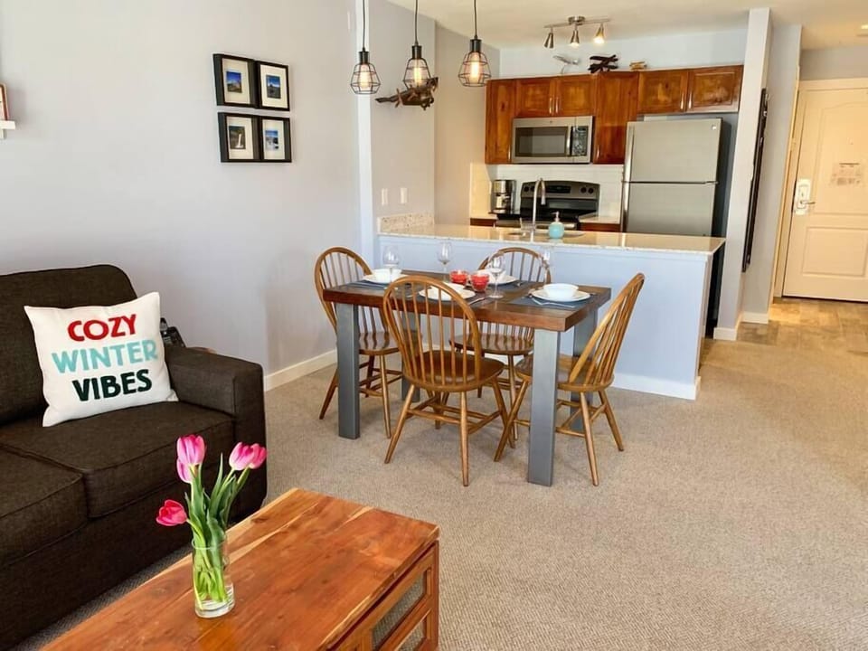 Living and dining area, updated with quality furnishings. Dine at our custom made, solid pine table.